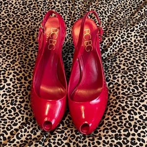 BCBG red platform sling back heels.